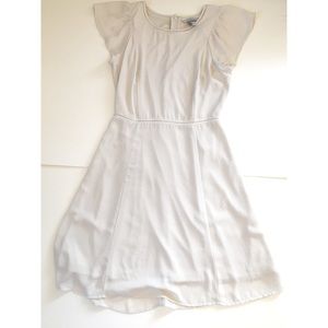 Cap sleeve cream flowy knee dress